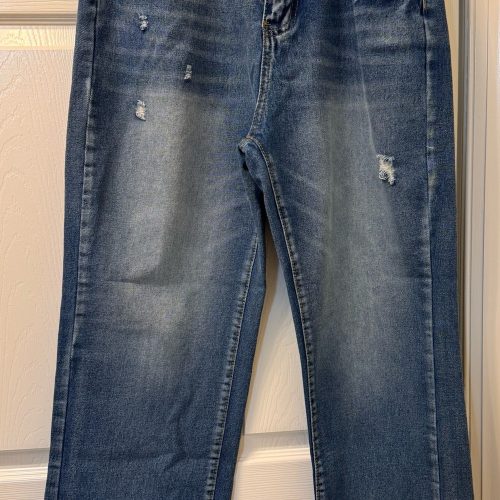 Blue Flare Wide Leg Jeans with Distressing and Vintage Wash